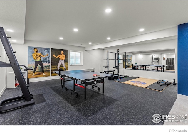 interior space with recessed lighting and baseboards