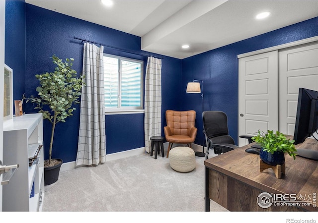 office space featuring recessed lighting, baseboards, carpet floors, and a textured wall