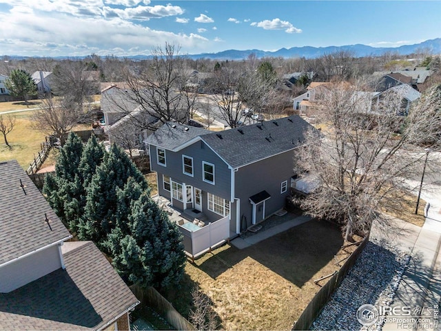 aerial view featuring a mountain view and a residential view