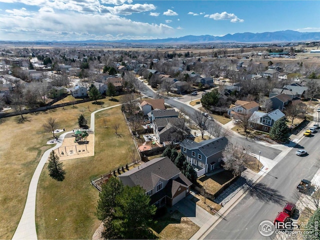 bird's eye view with a mountain view and a residential view