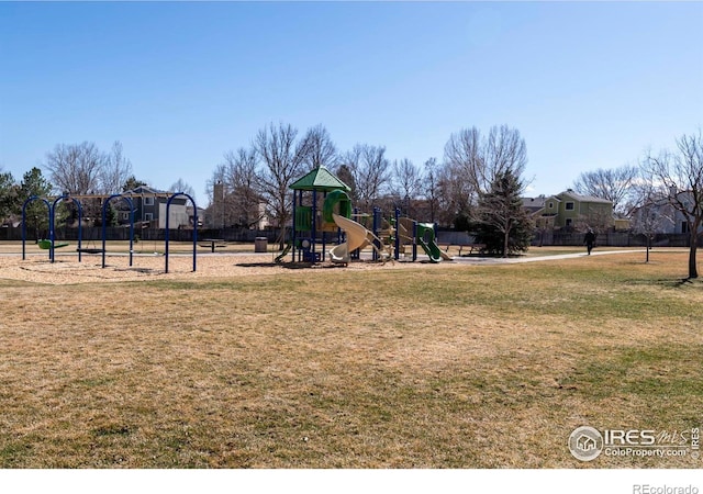 communal playground with a lawn