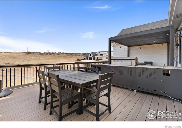 4528 Del Colina Way, Laporte, CO 80535 - wooden terrace featuring outdoor dining area