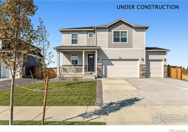 view of front of house with a porch, an attached garage, fence, and driveway