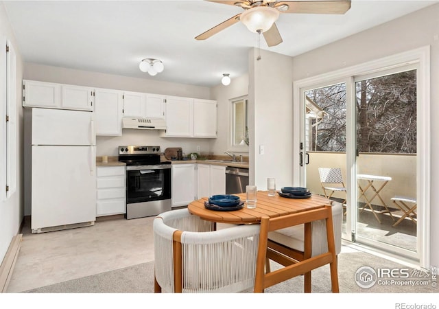 kitchen with under cabinet range hood, white cabinets, stainless steel appliances, a ceiling fan, and a sink