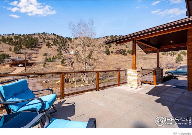 view of patio featuring a mountain view