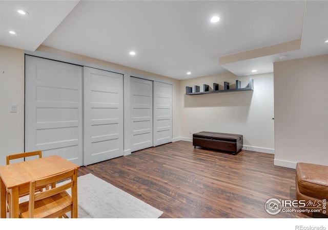 sitting room with recessed lighting, baseboards, and wood finished floors