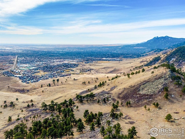 drone / aerial view featuring a mountain view