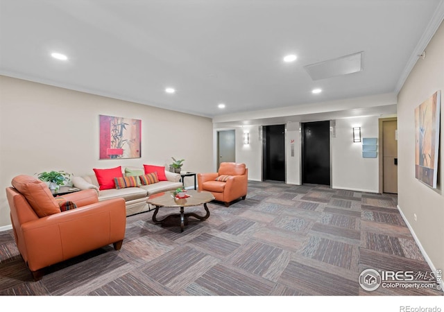 carpeted living room with elevator, recessed lighting, and attic access