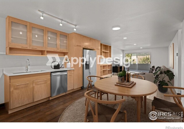 500 Mohawk Dr Unit 510, Boulder, CO 80303 - kitchen with stainless steel appliances, a sink, dark wood-style floors, light countertops, and glass insert cabinets