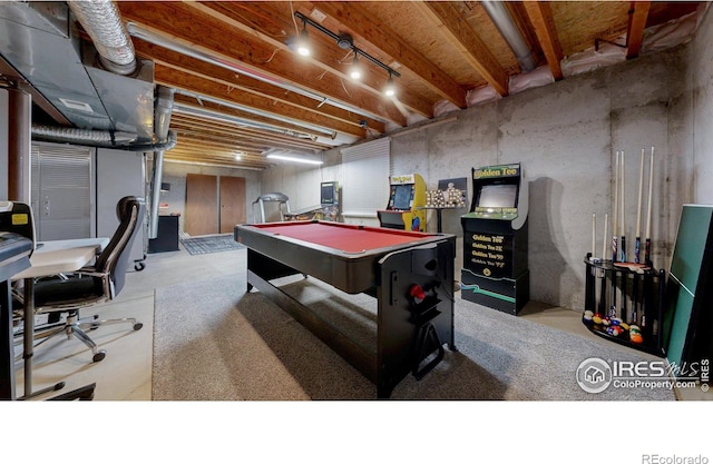 recreation room with concrete floors and billiards