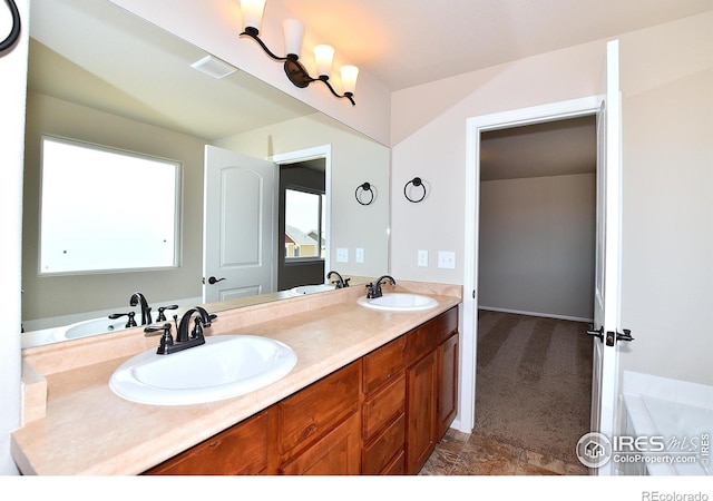 bathroom featuring a sink, visible vents, and double vanity