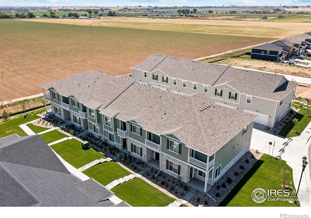 aerial view with a residential view and a rural view