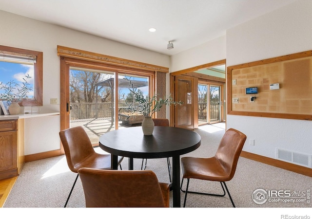 dining room with recessed lighting, baseboards, and visible vents