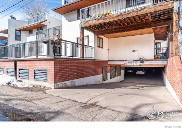 view of property exterior featuring brick siding