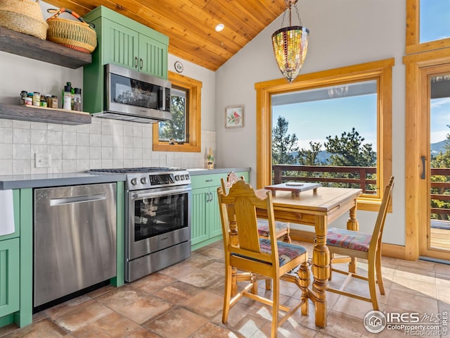 726 Alpine Dr, Estes Park, CO 80517 - kitchen with green cabinets, appliances with stainless steel finishes, vaulted ceiling, backsplash, and wood ceiling
