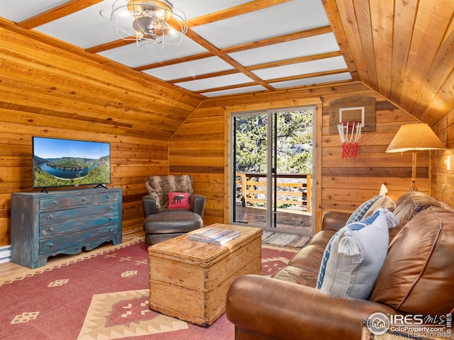 726 Alpine Dr, Estes Park, CO 80517 - living area featuring wood walls, lofted ceiling, and a ceiling fan