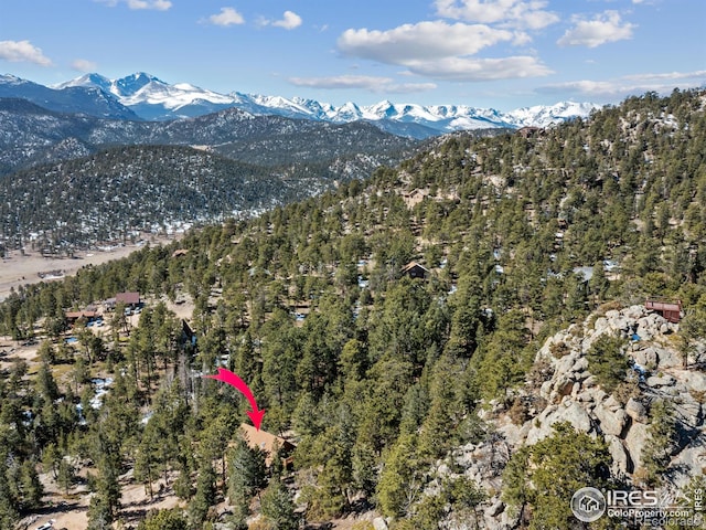726 Alpine Dr, Estes Park, CO 80517 - aerial view of mountains and a heavily wooded area
