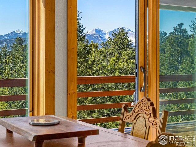 726 Alpine Dr, Estes Park, CO 80517 - sunroom / solarium featuring a mountain view