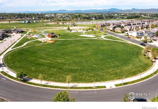 aerial view with a mountain view and a residential view