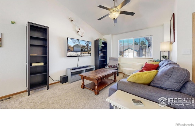 living area with a ceiling fan, baseboards, visible vents, vaulted ceiling, and light carpet