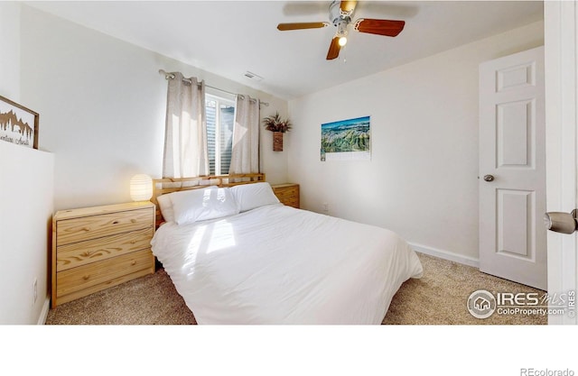 bedroom with visible vents, baseboards, a ceiling fan, and carpet flooring