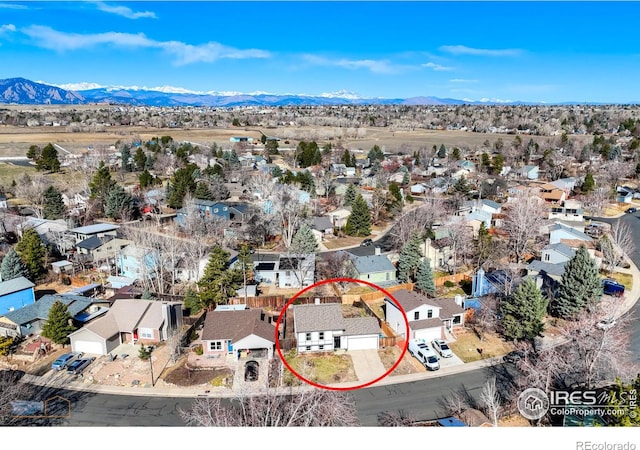 aerial view with a mountain view and a residential view