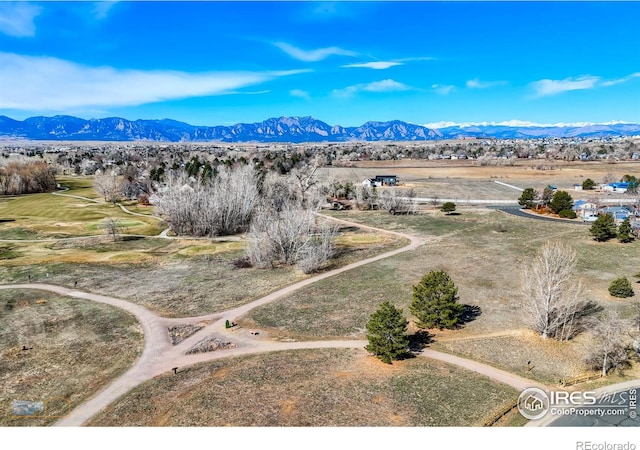 birds eye view of property featuring a rural view and a mountain view