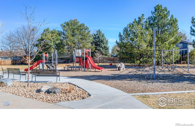 community play area featuring fence