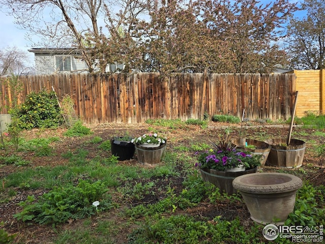 view of yard with fence