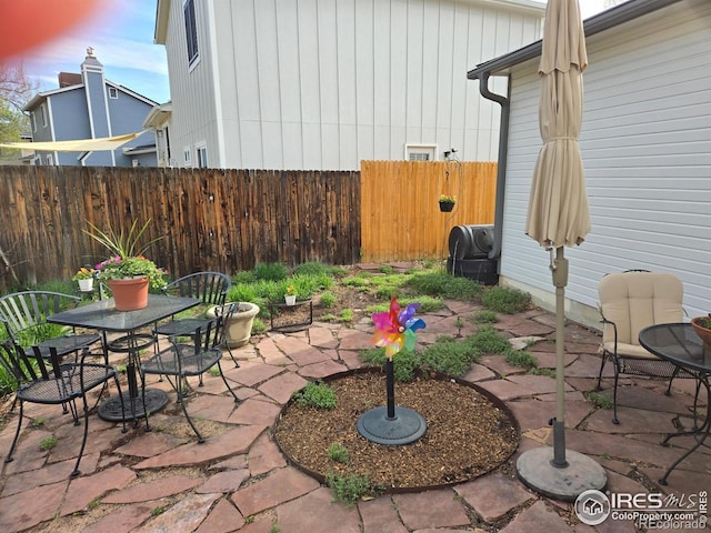 339 S Hoover Ave, Louisville, CO 80027 - view of patio / terrace featuring fence and outdoor dining area