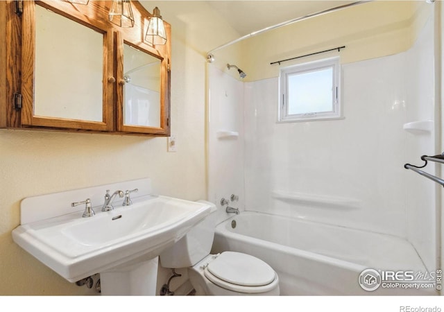 full bath with a sink, toilet, and shower / bathtub combination