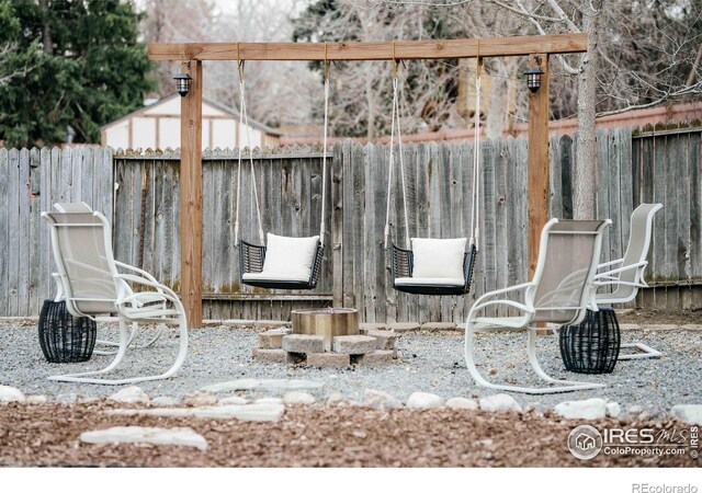 exterior space featuring a fenced backyard