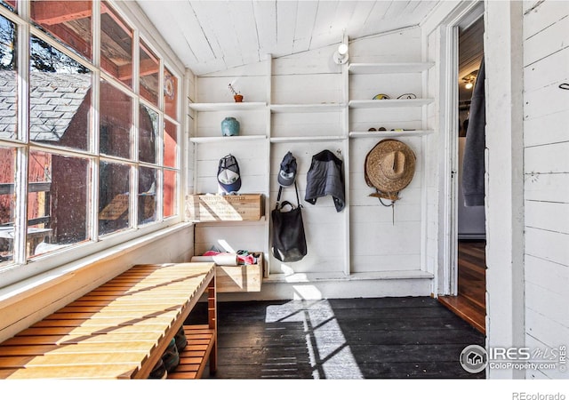 mudroom featuring lofted ceiling, wooden walls, wood-type flooring, and wooden ceiling