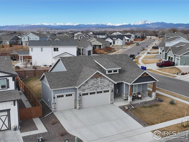 bird's eye view with a mountain view and a residential view