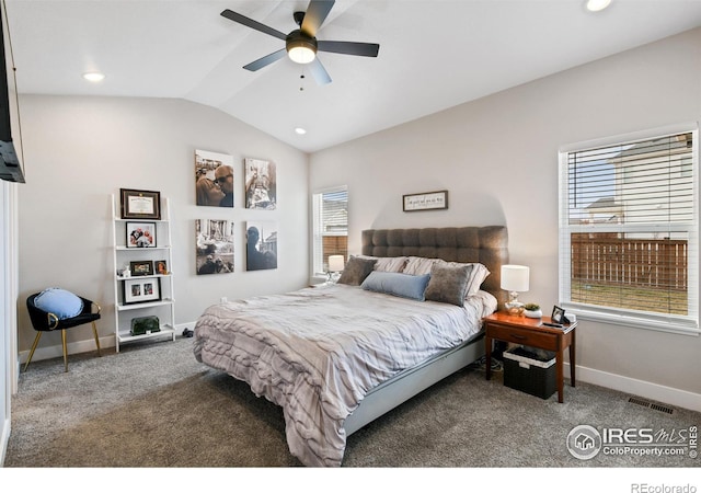 bedroom with carpet, vaulted ceiling, baseboards, and visible vents