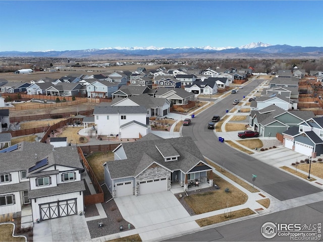 birds eye view of property featuring a residential view and a mountain view