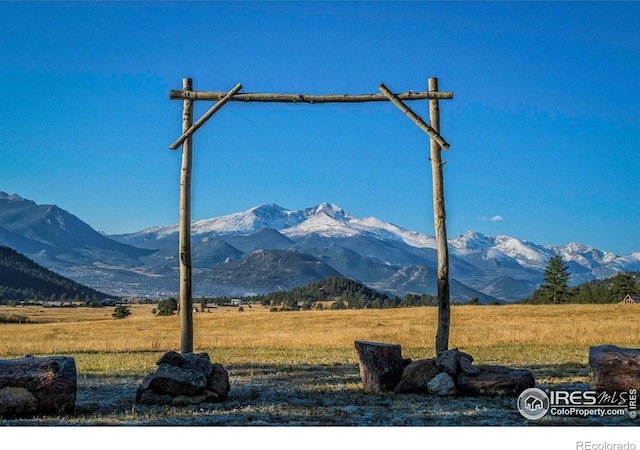 property view of mountains with a rural view