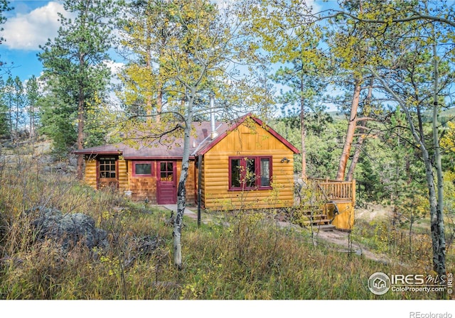 view of log home