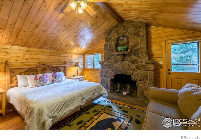 3501 Devils Gulch Rd, Estes Park, CO 80517 - bedroom featuring wooden ceiling, wood finished floors, and wood walls