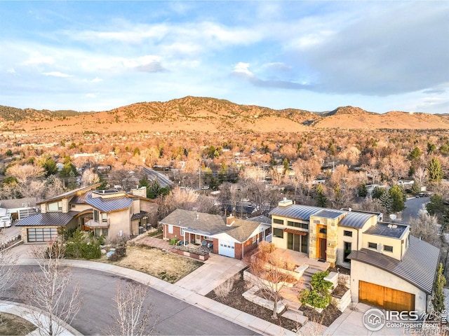 bird's eye view with a residential view and a mountain view