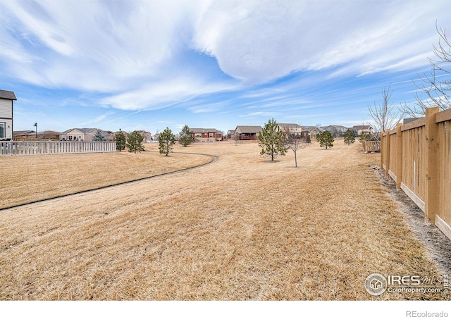 view of yard with fence