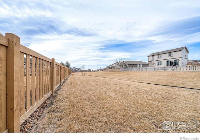 view of yard featuring fence