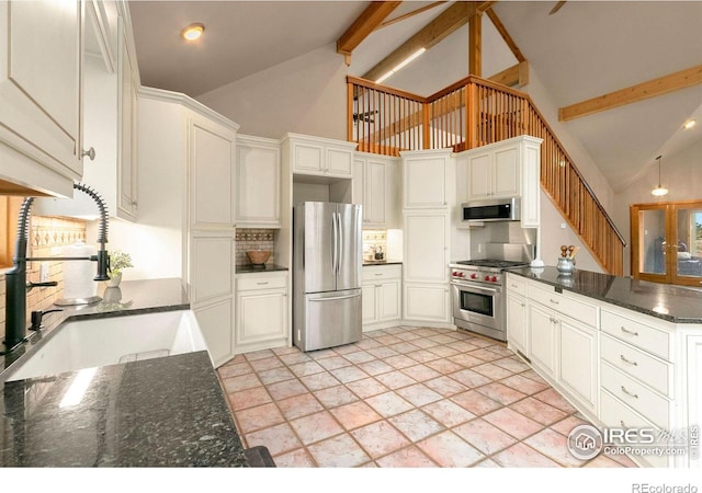 kitchen with a sink, stainless steel appliances, beam ceiling, and decorative backsplash