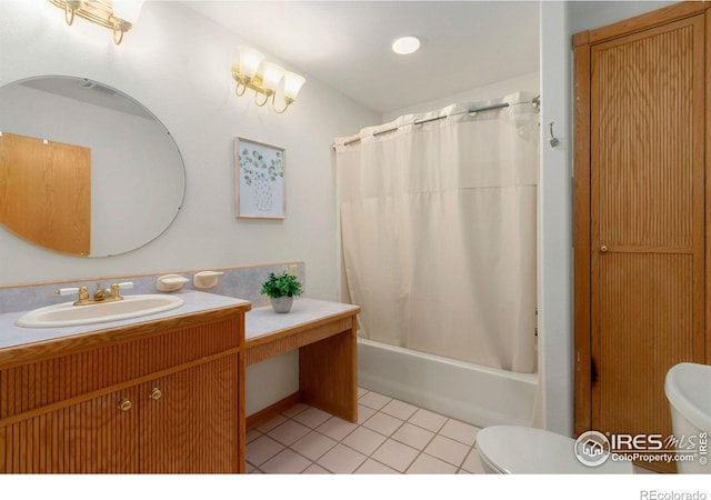 full bathroom featuring tile patterned flooring, toilet, vanity, and shower / tub combo