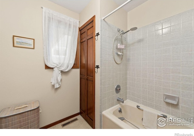 full bath featuring visible vents, baseboards, and shower / bathtub combination