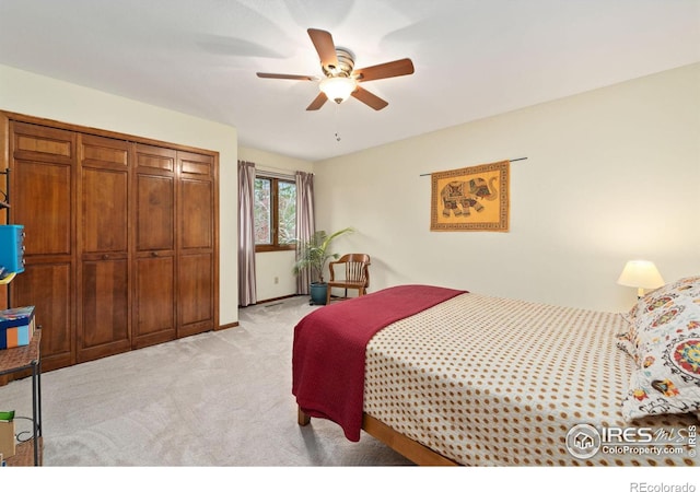 bedroom with light colored carpet and ceiling fan