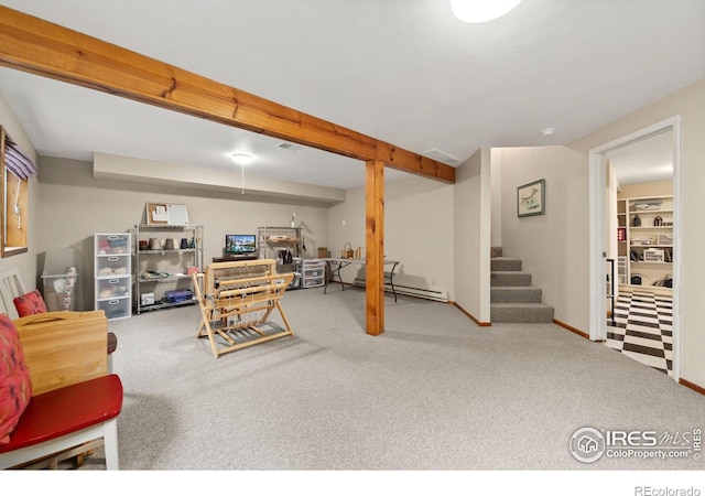 interior space with stairway, carpet floors, baseboards, and a baseboard radiator