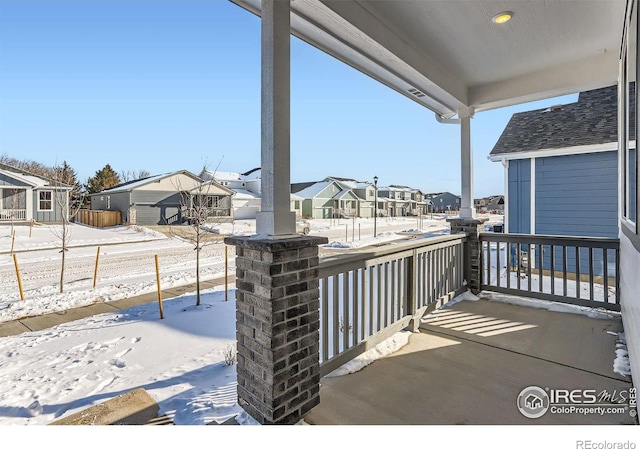 view of patio / terrace featuring a residential view and a balcony