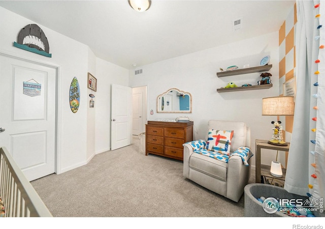 bedroom with carpet, visible vents, and baseboards