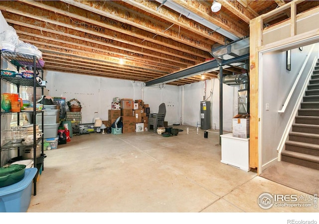 unfinished below grade area with water heater and stairs